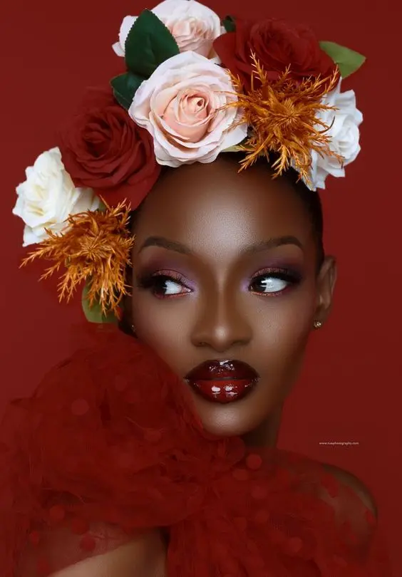 Portrait of a woman crowned with roses